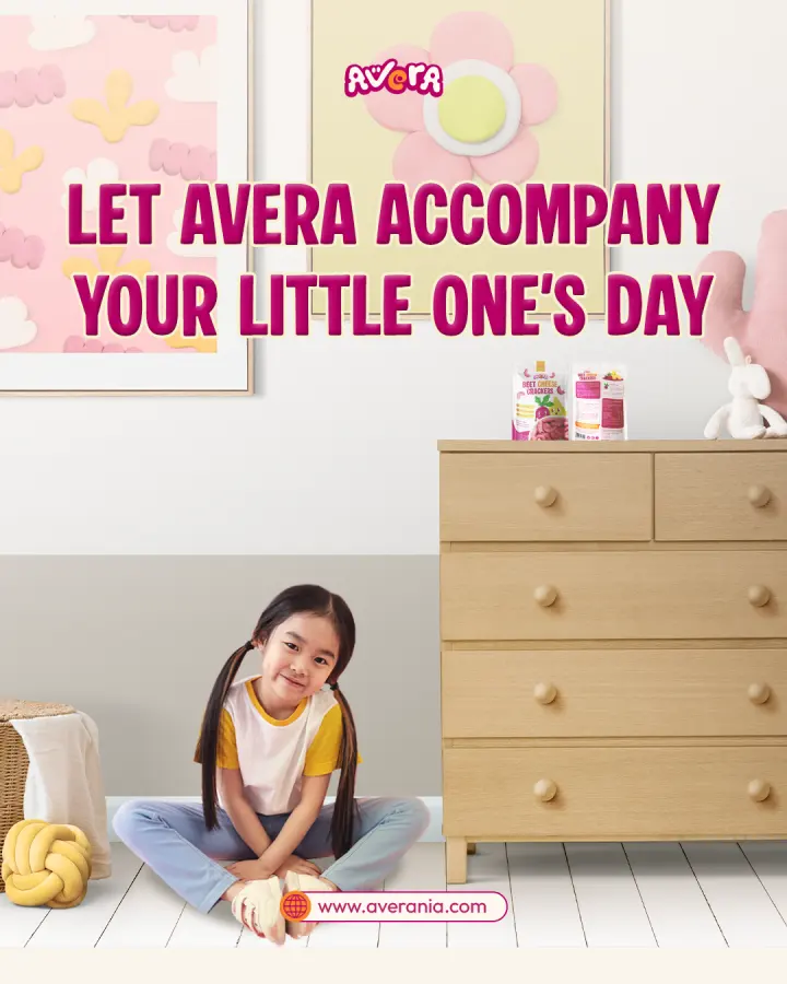 A child enjoying AVERA Beet Cheese Crackers at home
